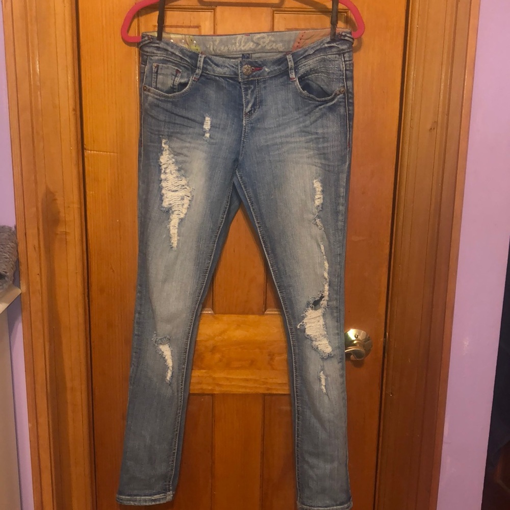 Distressed denim jeans